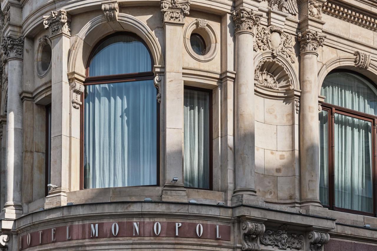 Hotel Monopol Wroclaw Bagian luar foto The hotel's name on the front of the building