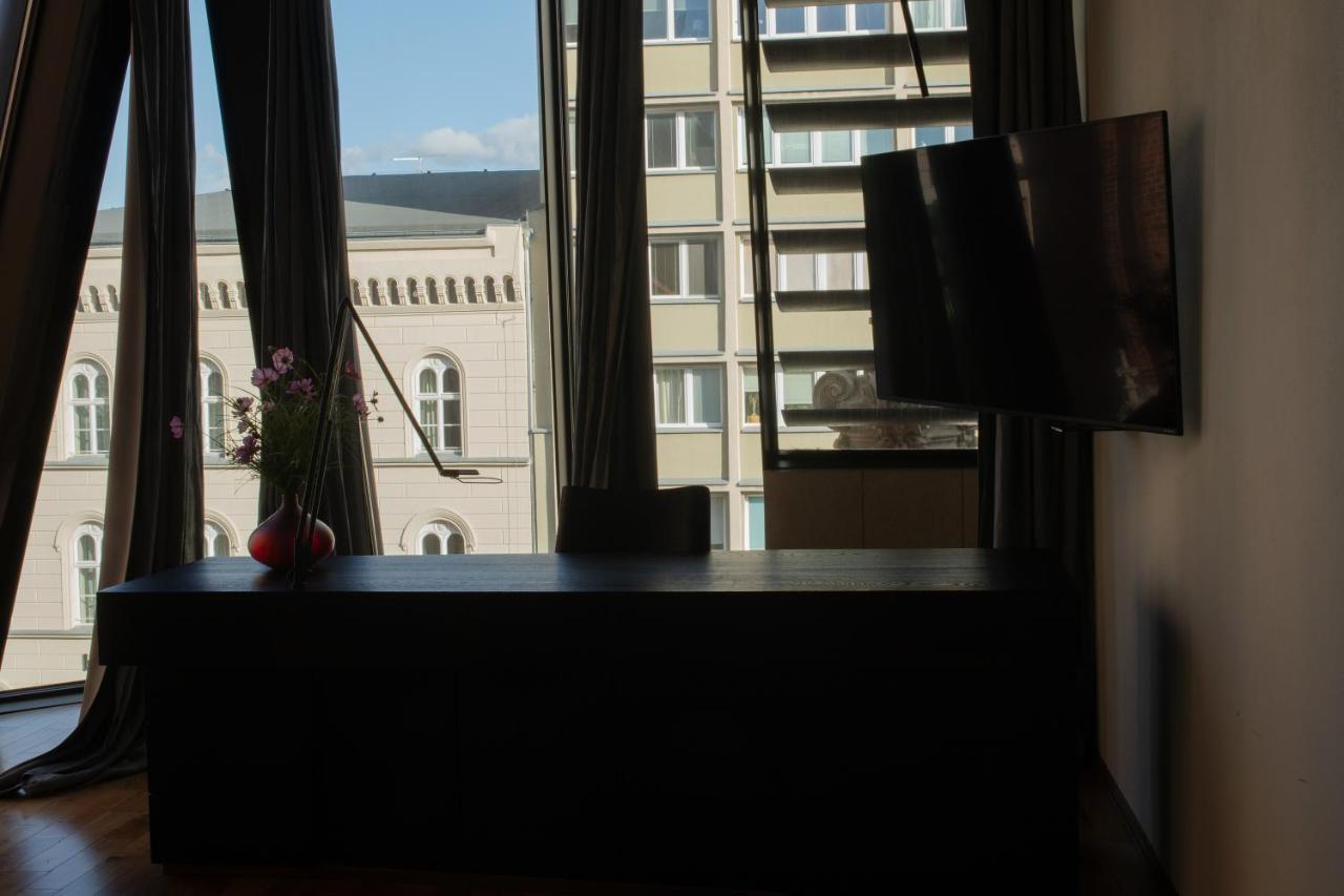 Hotel Monopol Wroclaw Bagian luar foto A room at the hotel